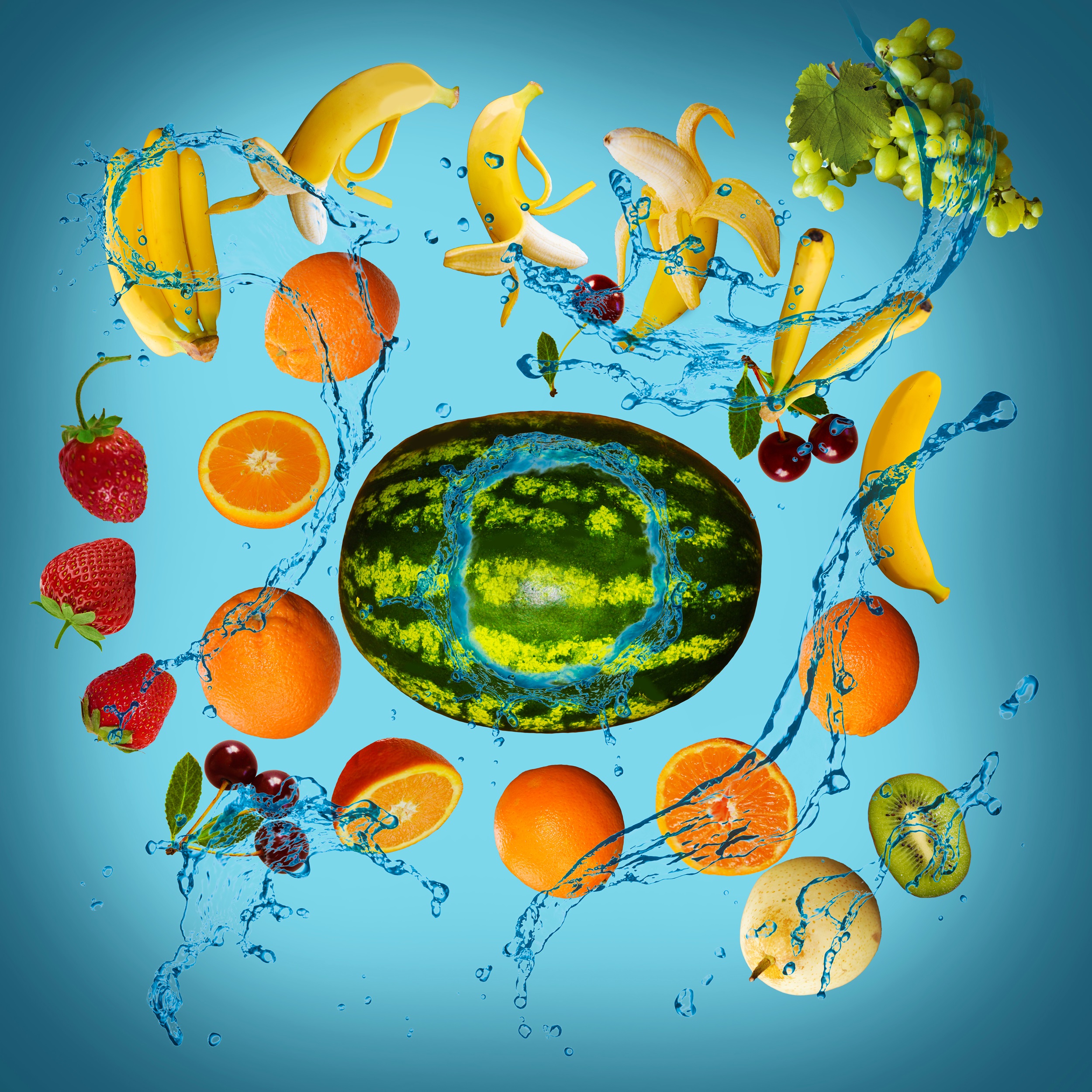 Panorama with fruits in splashes of water